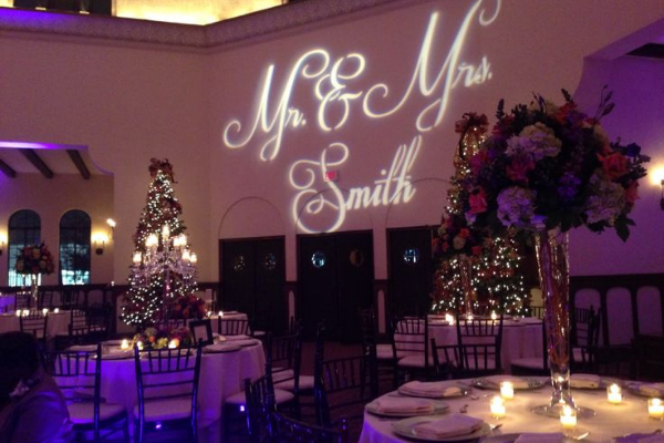 Projected name display at an elegant wedding reception