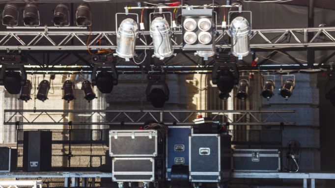 Stage lighting setup with multiple spotlights and effects.