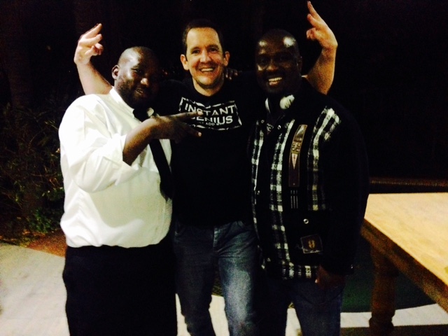 Three event team members posing together