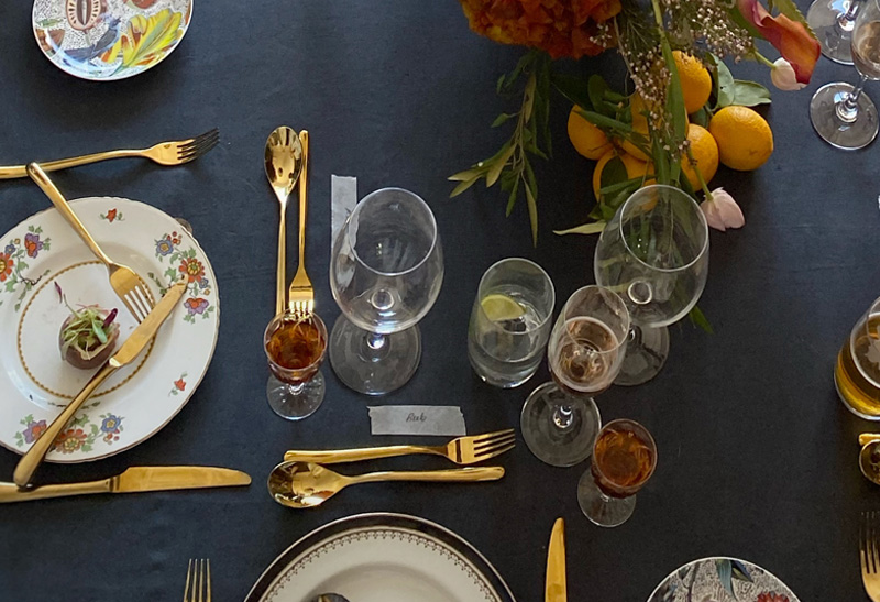 Beautifully set dining table with elegant tableware and decor