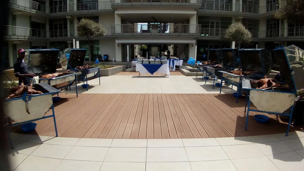 Outdoor setup with multiple spit braai stations.