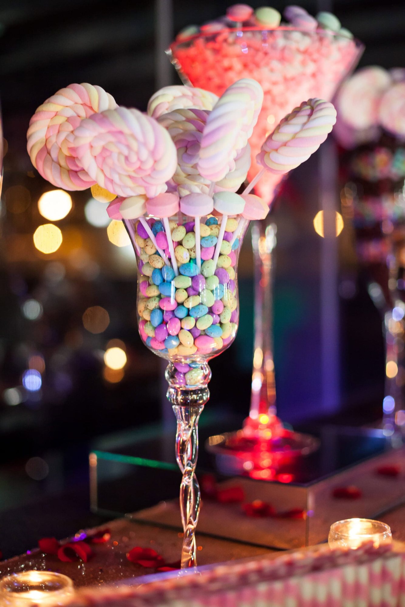 An elegant candy display with lollipops and colourful sweets.