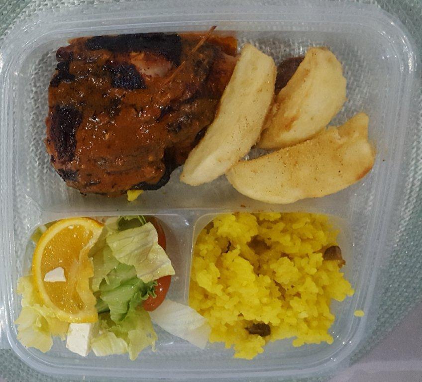 Halaal chicken platter with rice and salad
