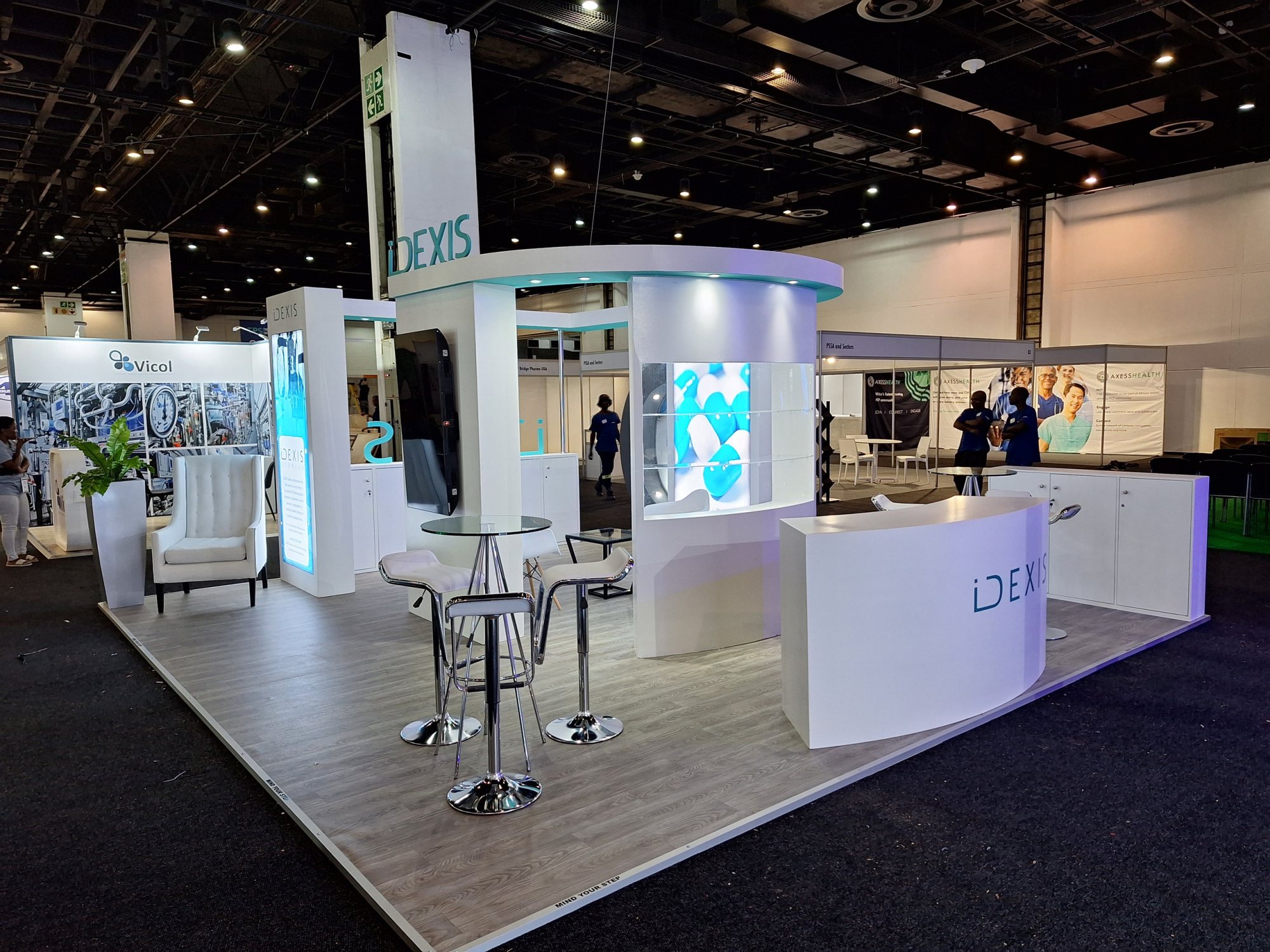 Custom exhibition stand featuring branding and display elements