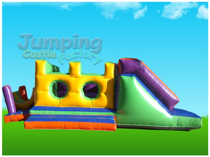Colorful inflatable water castle setup against blue sky.