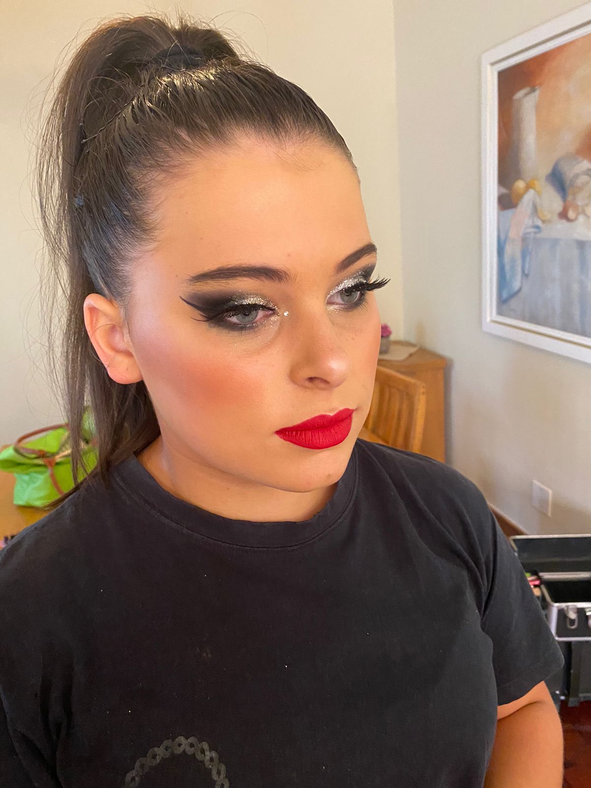 Close-up of a model showcasing dramatic glam makeup