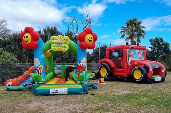 Colorful themed jumping castle setup for toddlers