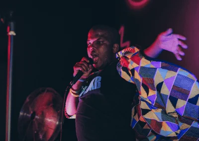 Singer performing karaoke on stage