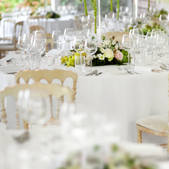 Elegant table setting with glassware and floral centerpiece