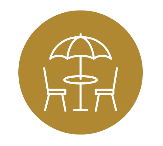 Icon of a table, two chairs, and an umbrella