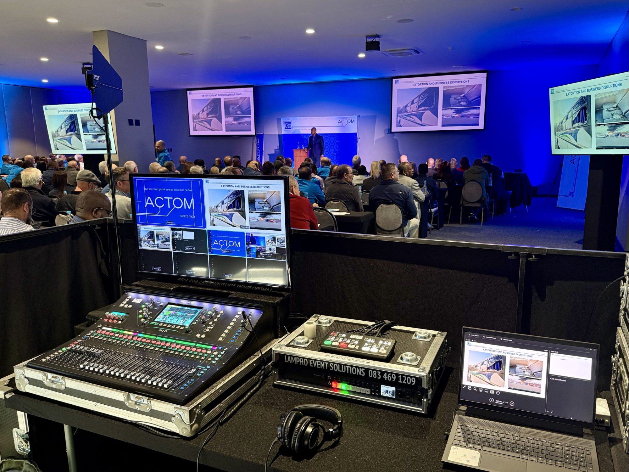 Sound and AV equipment set up for a corporate event