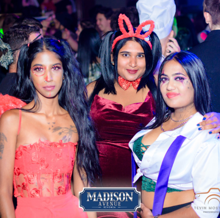 Three guests enjoying a vibrant party at Madison Avenue Rivonia.