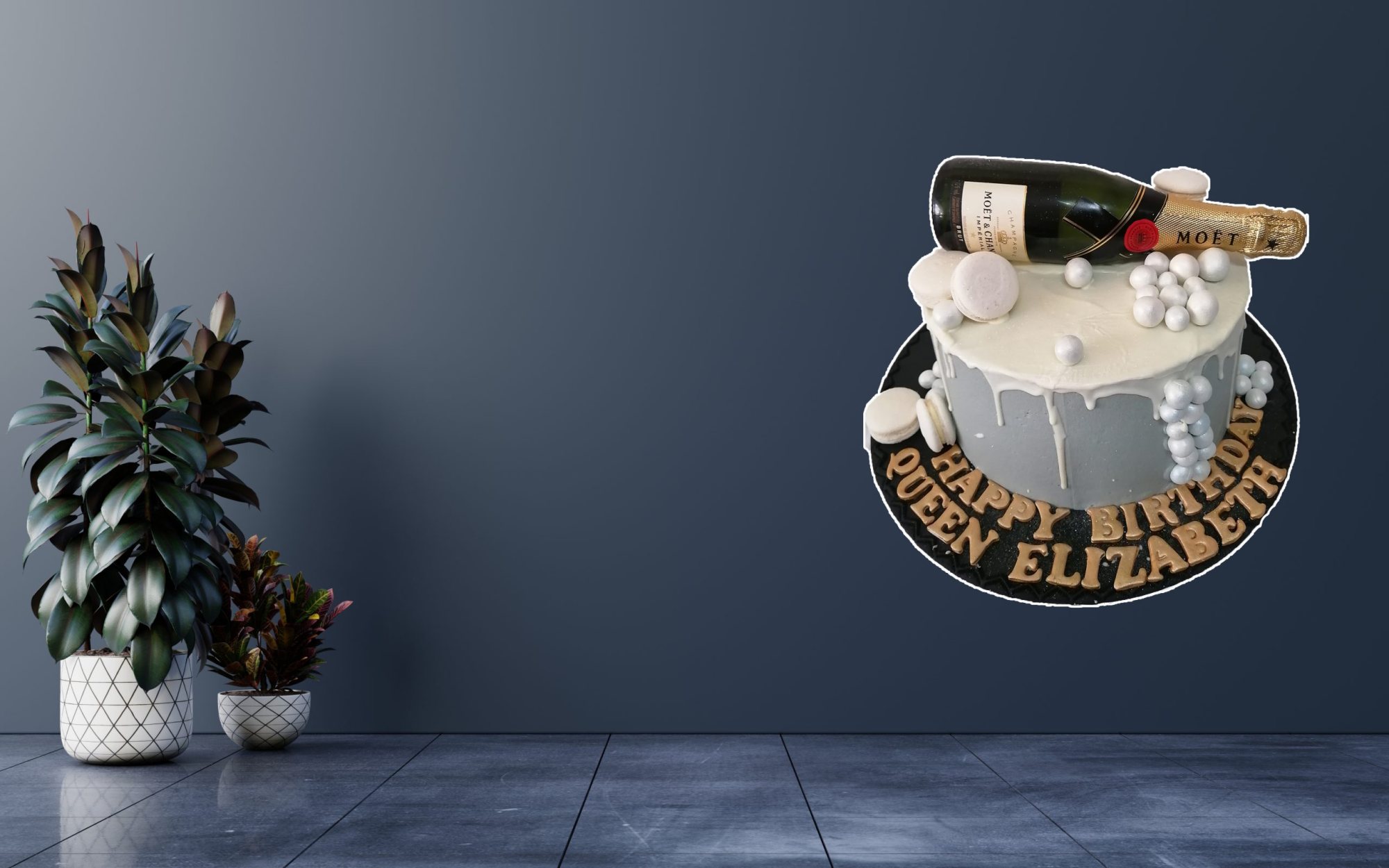 Birthday cake with champagne bottle and decorative elements