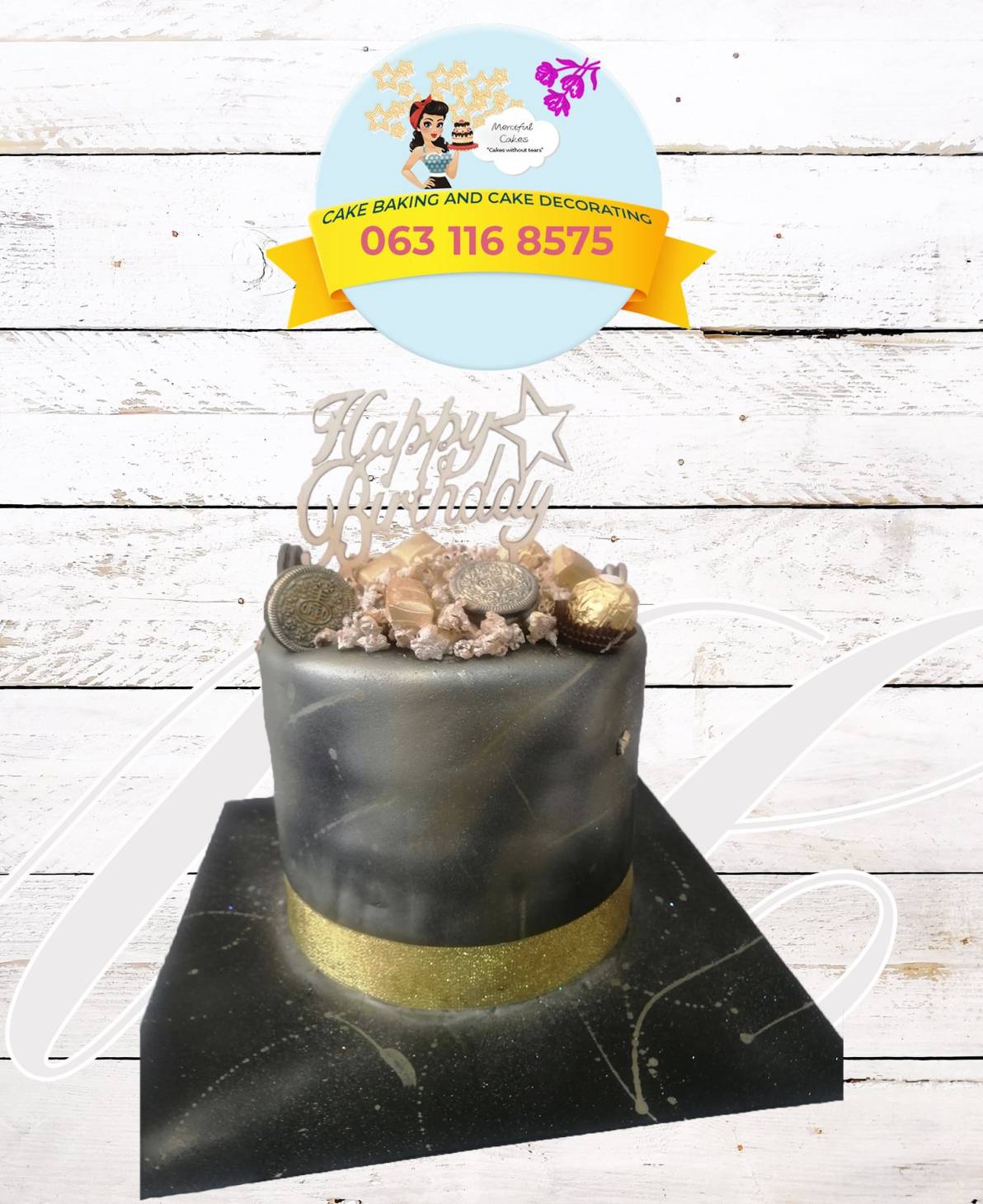 Black and gold birthday cake with decorative topper.