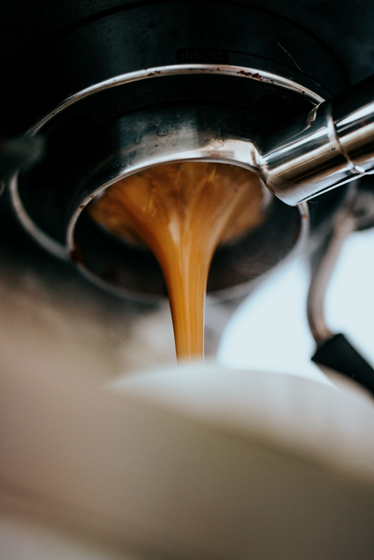 Espresso brewing from a coffee machine