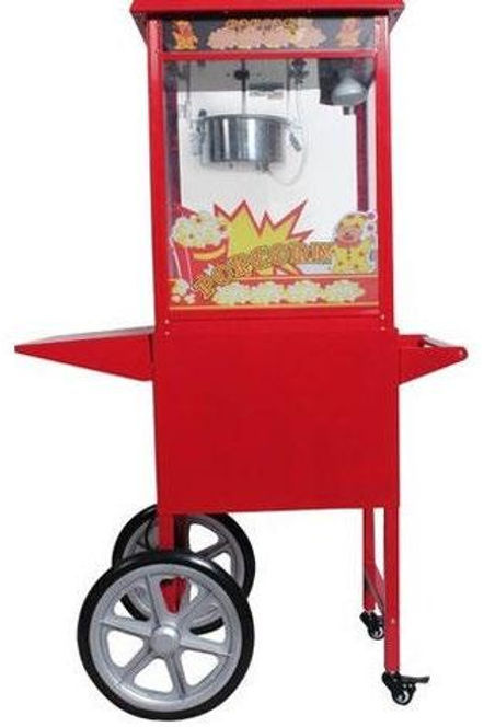 Popcorn machine on a cart with a red exterior