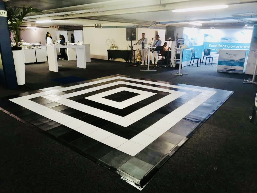 Black and white patterned dance floor in event space
