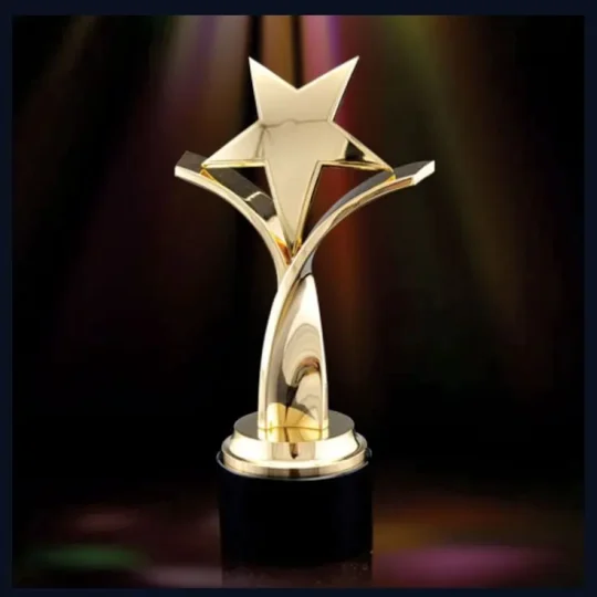Gold star trophy on a black base