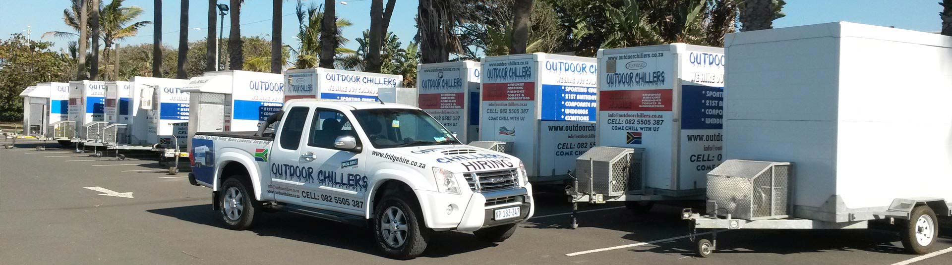 Row of mobile cold rooms with an Outdoor Chillers vehicle