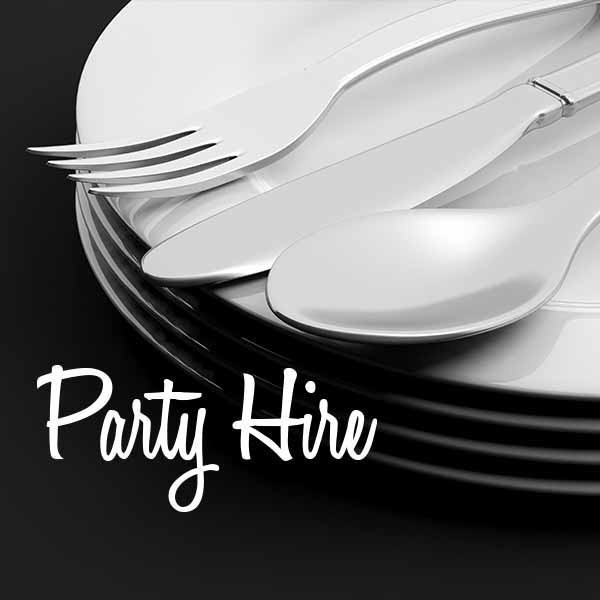 Elegant stacked plates with fork and spoon.
