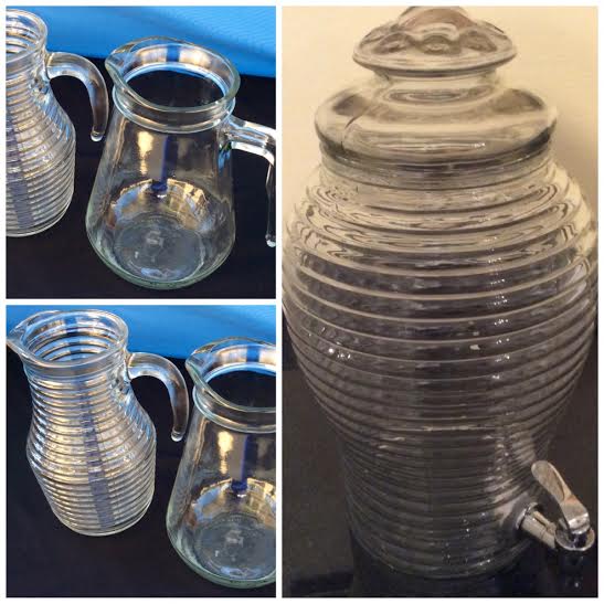 Two glass beverage dispensers with ribbed design