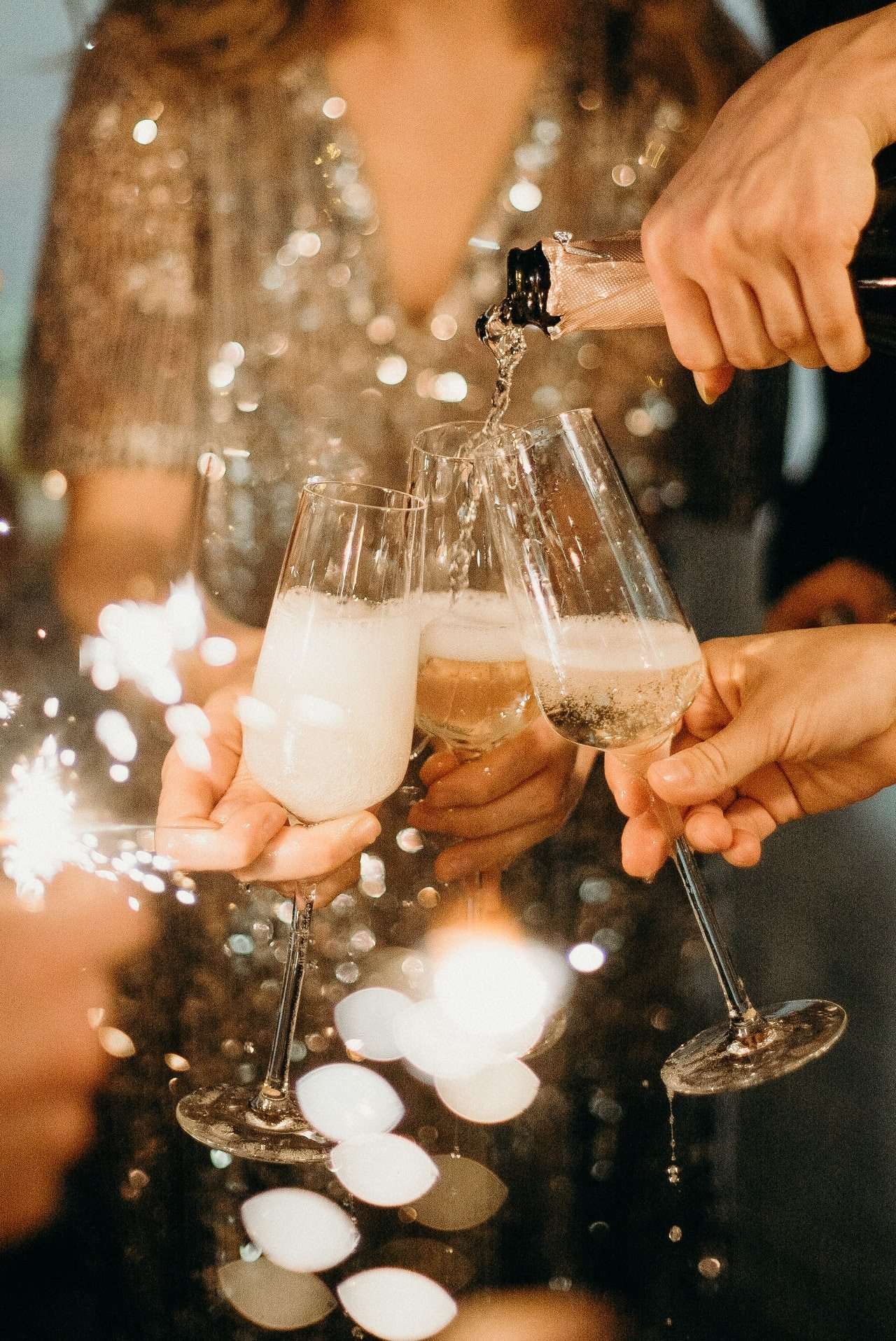 Guests toasting with champagne flutes