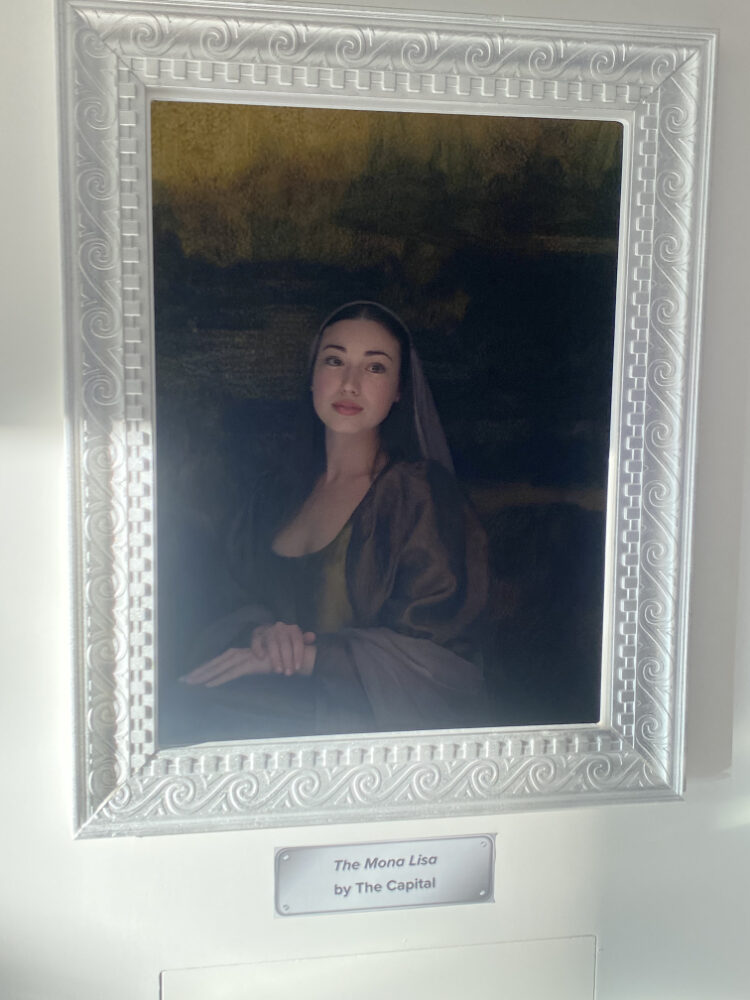 Framed portrait resembling the Mona Lisa