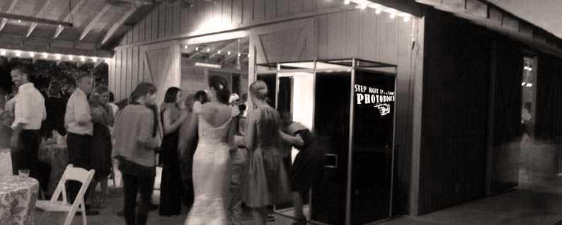 Guests entering a photo booth at an event