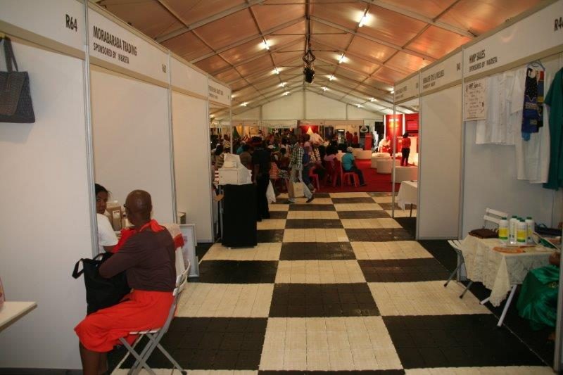 Black and white portable flooring in a tent exhibition