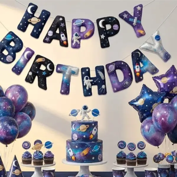 Space-themed birthday setup with cake, balloons, and a banner