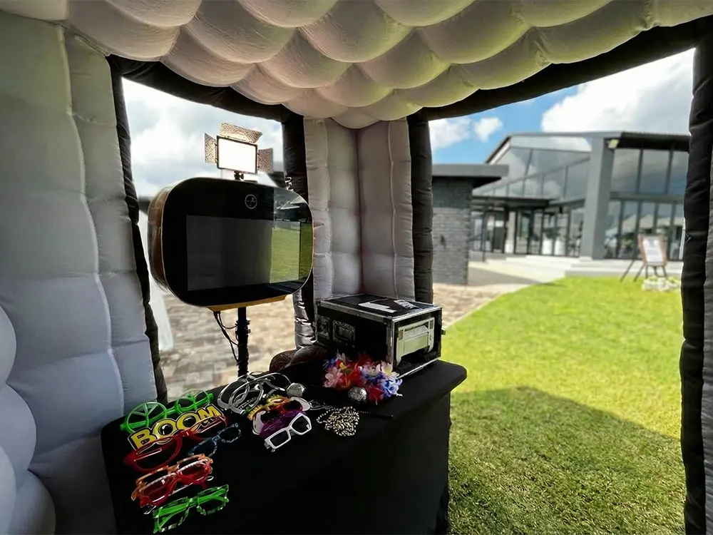 Interior view of an inflatable photo booth with props