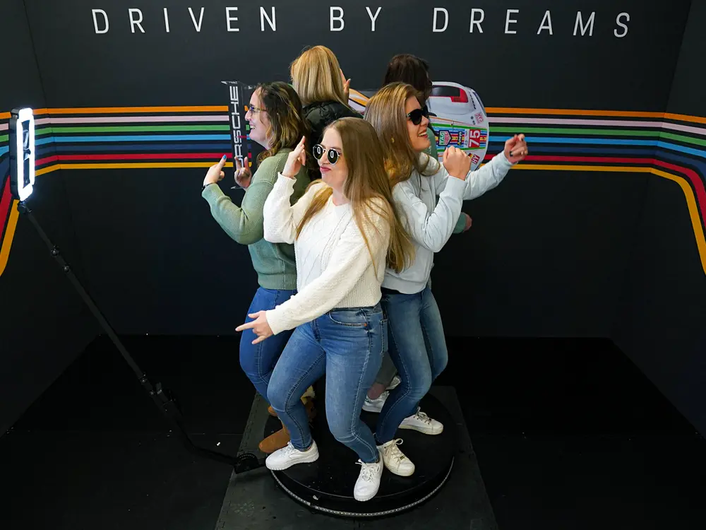 Group of friends posing in a 360 Video Booth