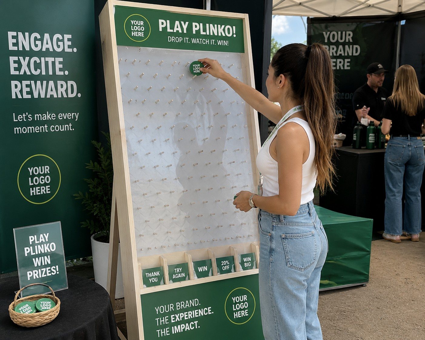A person playing the Plinko game at an event