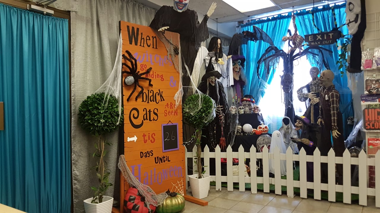 Halloween display with countdown sign and spooky decorations