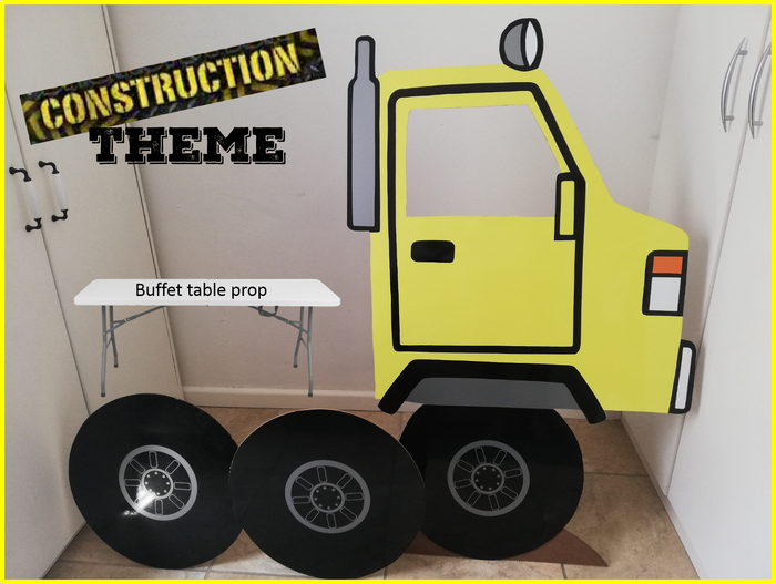 Buffet table prop designed like a construction vehicle.