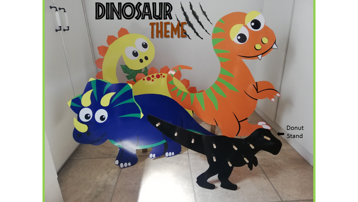 Colorful dinosaur cutouts for children's party decor