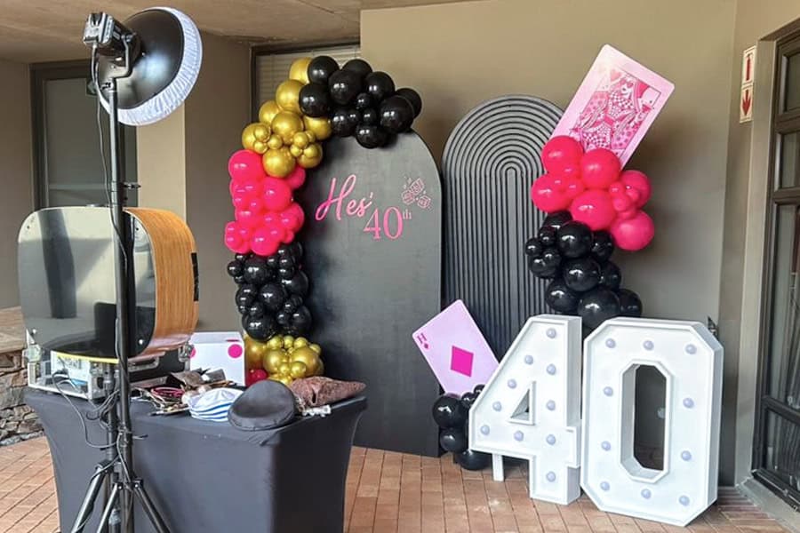 Balloon arch and decor for a 40th birthday party