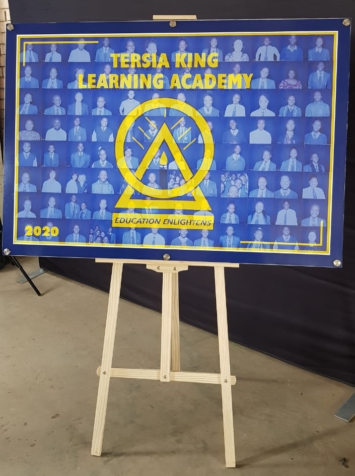 A display board featuring student photos from Tersia King Learning Academy 2020