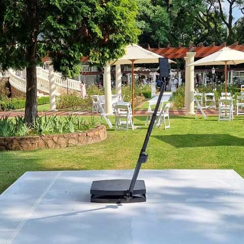 360 Spin booth setup in a garden venue