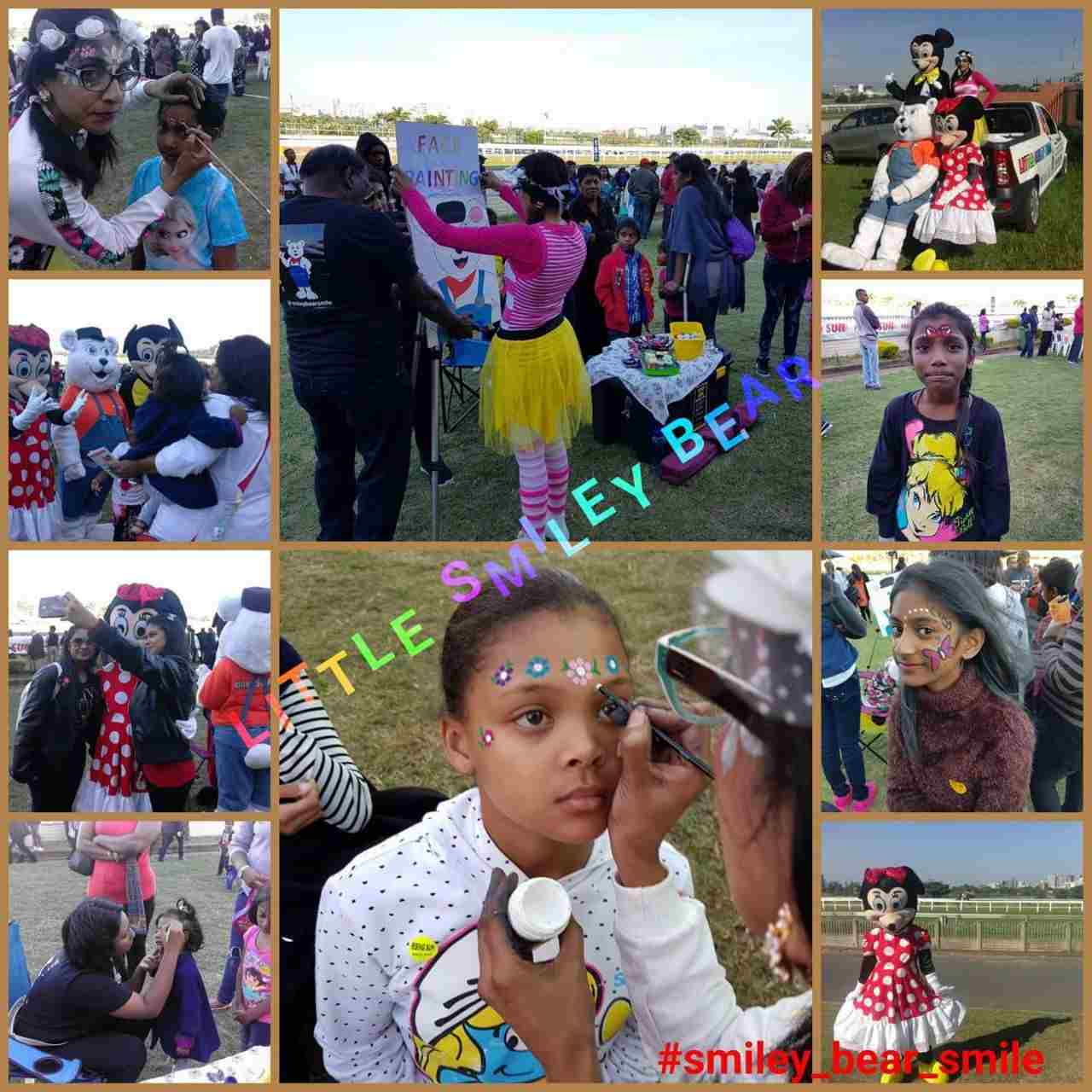 Children enjoying face painting and interacting with mascots.