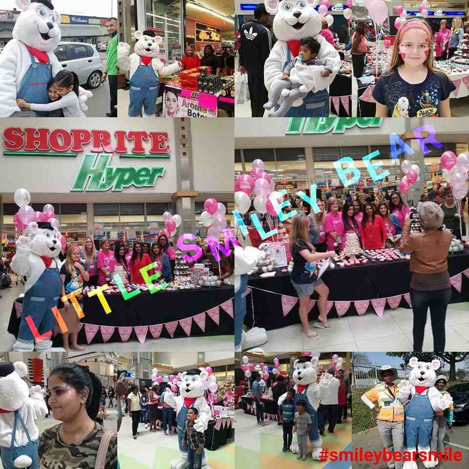 A shopping center event with a mascot and balloons