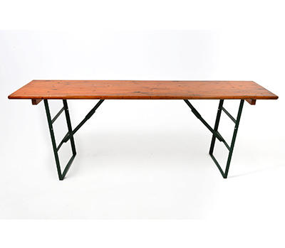 Rustic wooden folding table with a green frame