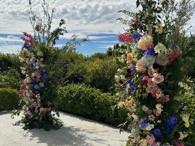 Colorful floral installations in an outdoor setting