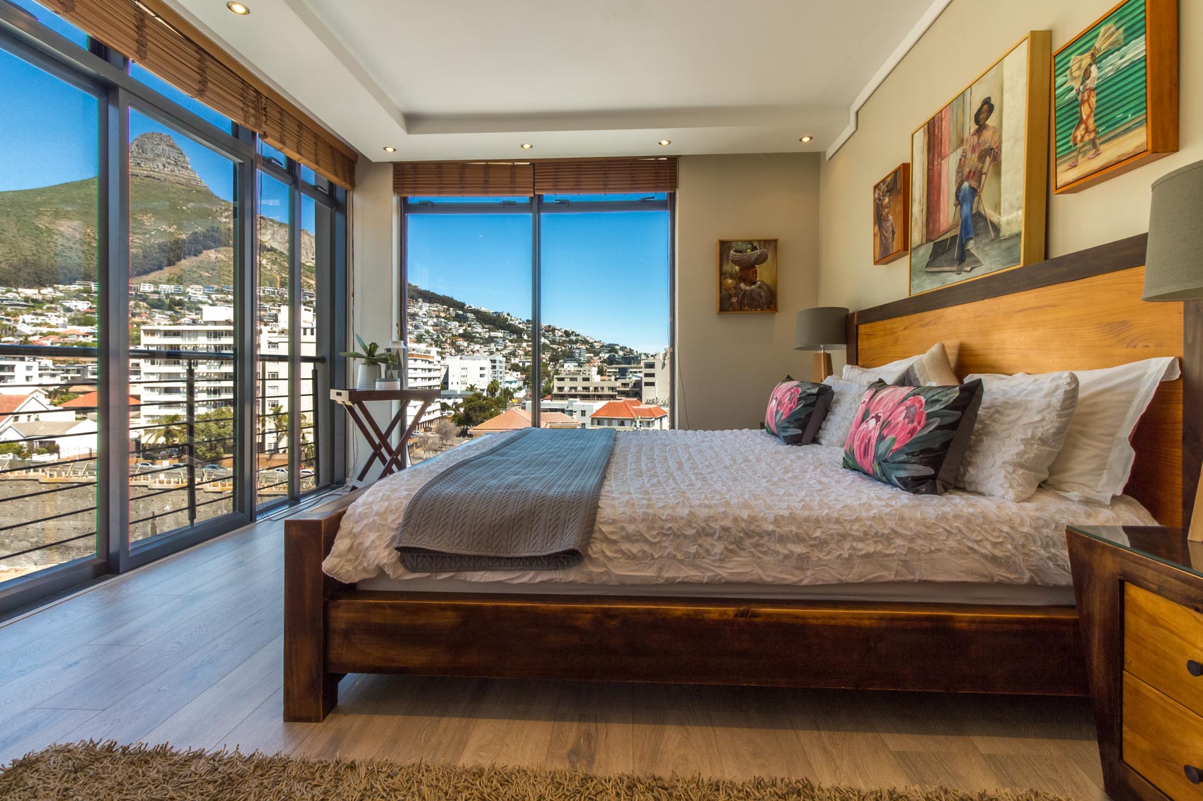 Interior view of a stylish apartment with mountain backdrop