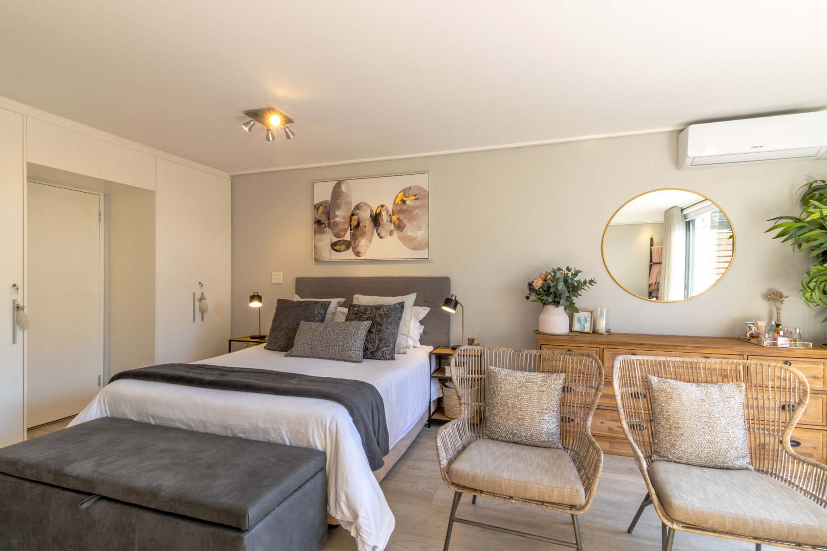 Stylish event space with bed and seating area