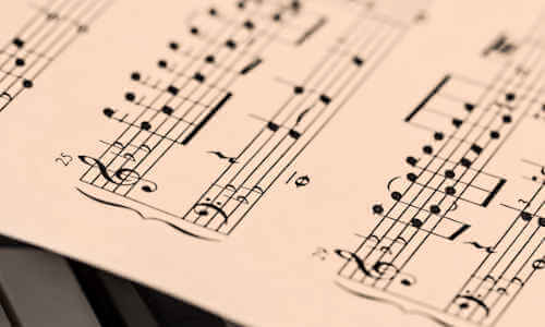 Close-up of sheet music with notes and symbols