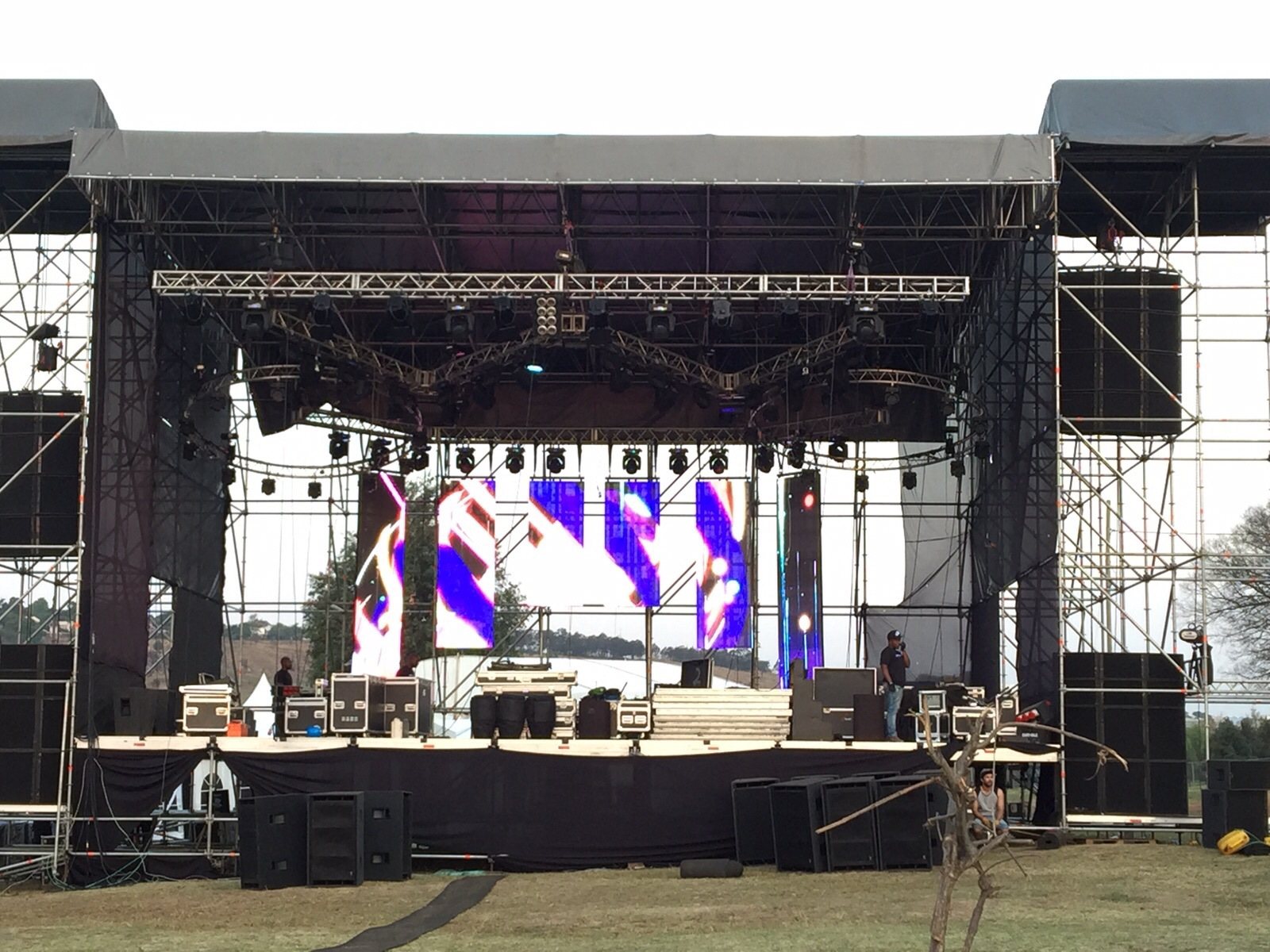 Large stage with LED screens and sound equipment