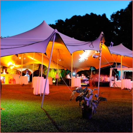 Large stretch tent with soft lighting set up for an event