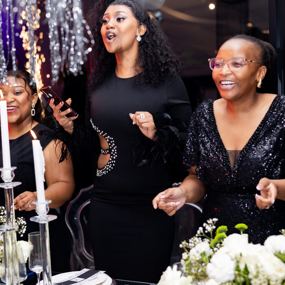 Group of women enjoying a celebration at Suitability Gardens