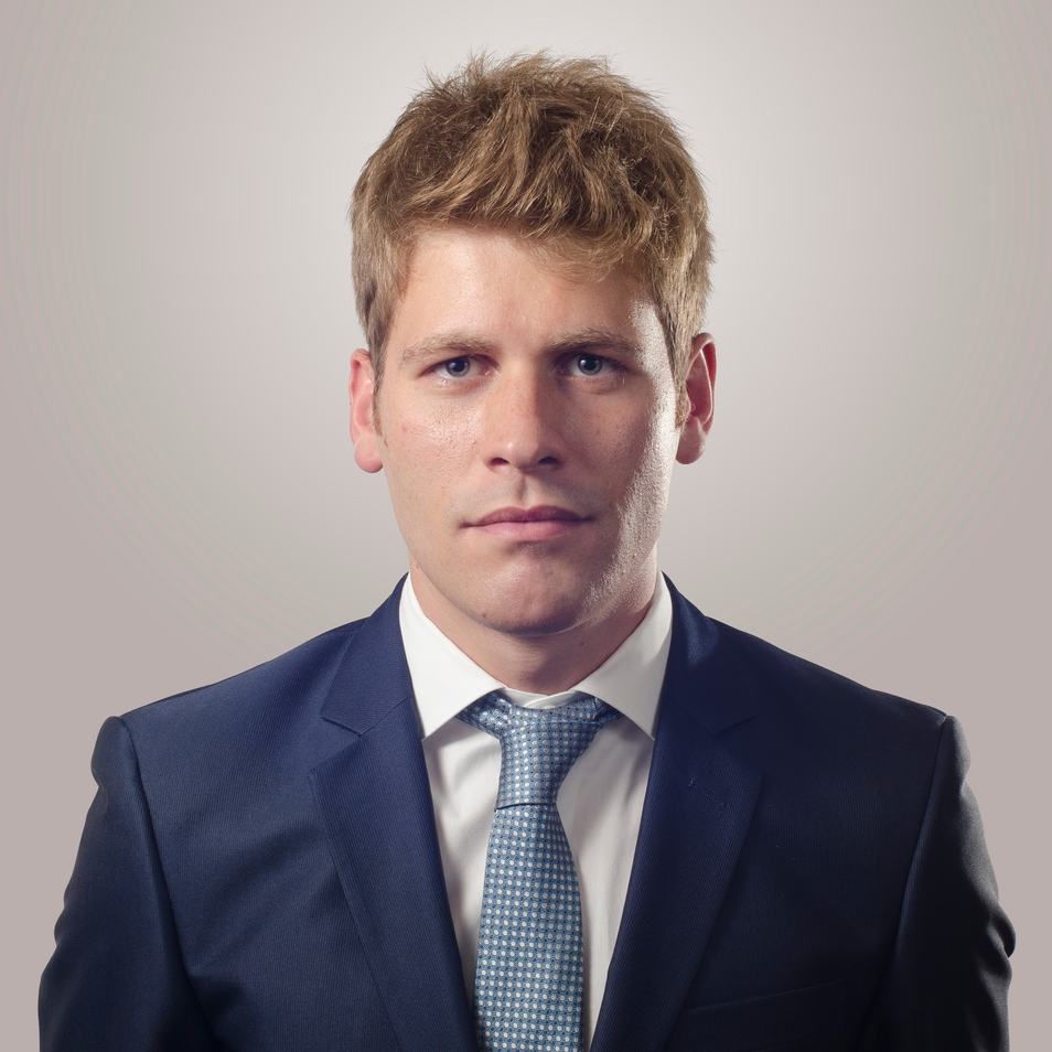 Young man in a suit with a serious expression